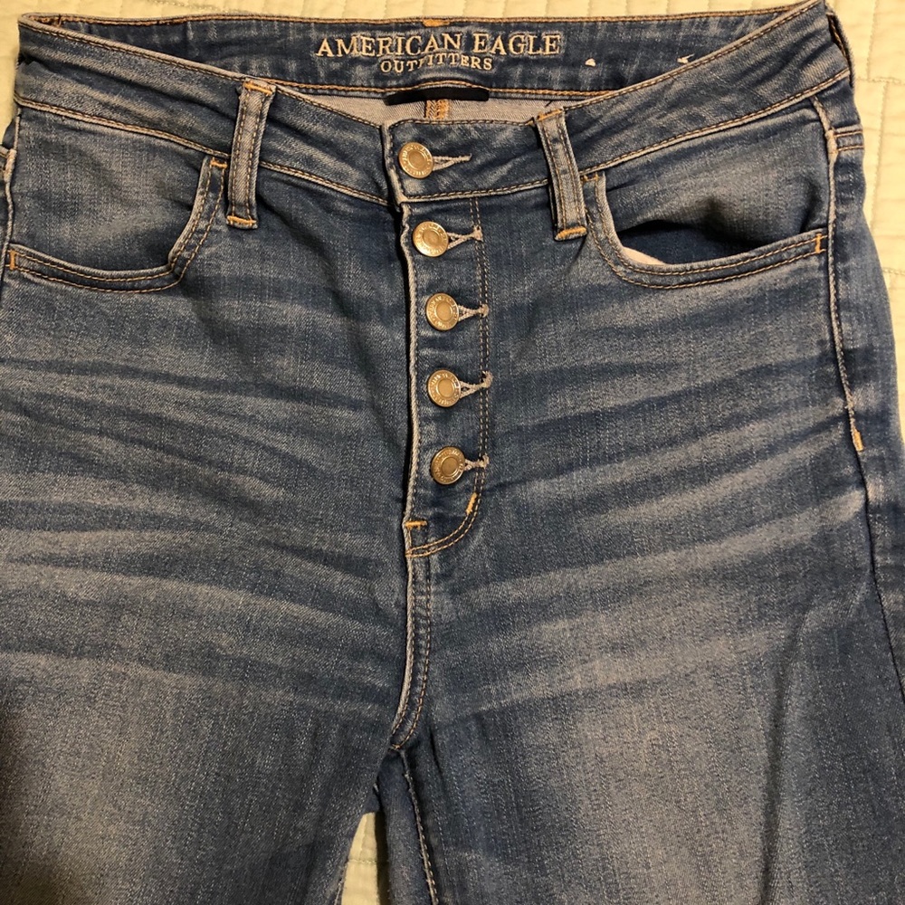 Button fly skinny jeans